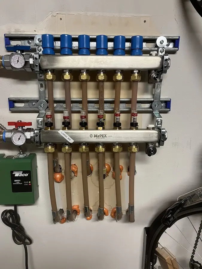 Plumber performing Gas Line Installation at a residential property in Angola